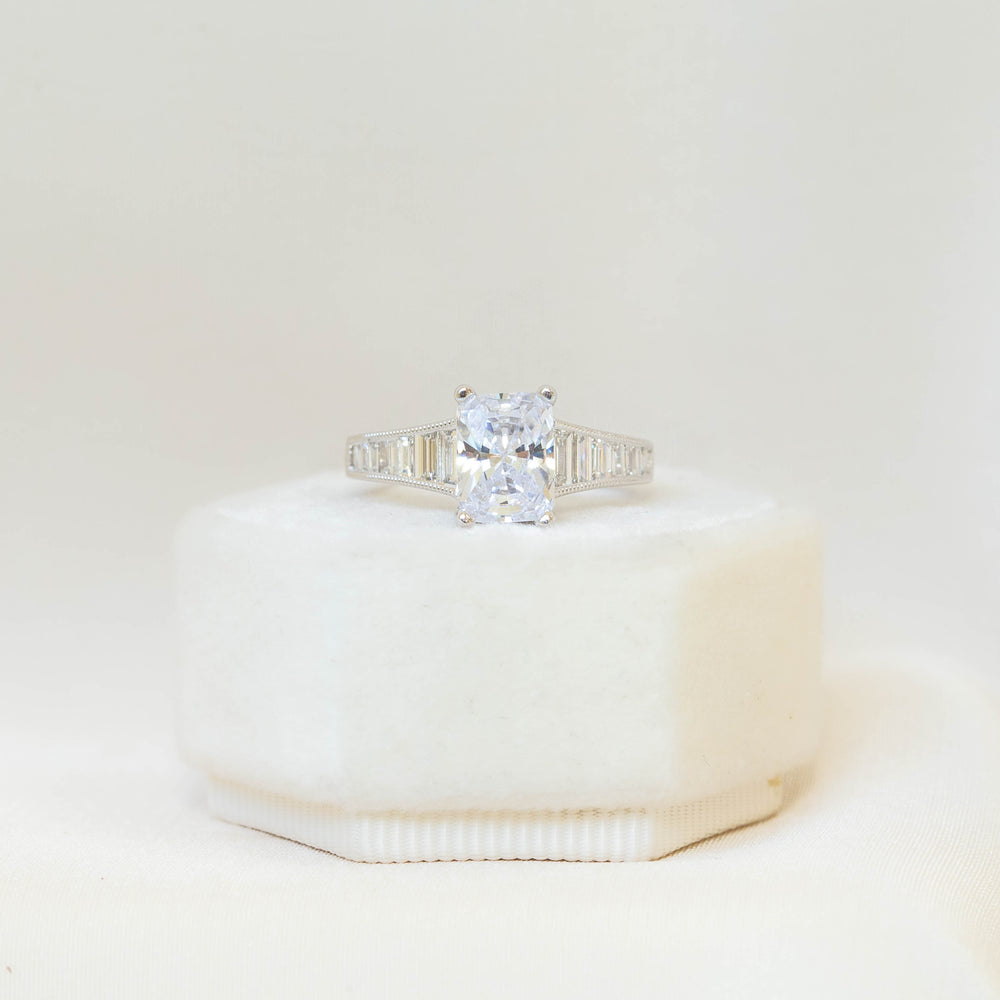14kw Emerald Graduated Baguette Diamond Ring