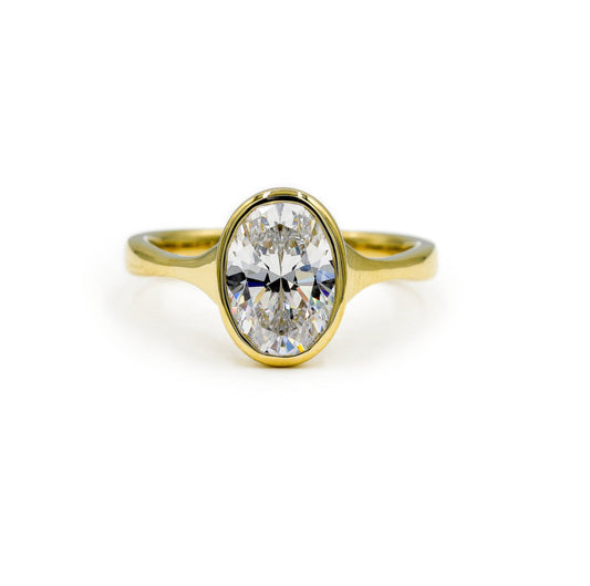 14ky Oval-Cut Bezel Tapered Cathedral Diamond Ring