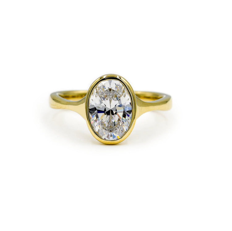 14ky Oval-Cut Bezel Tapered Cathedral Diamond Ring
