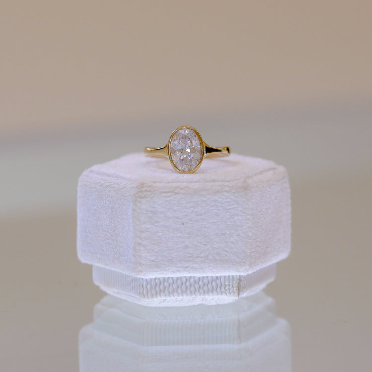 14ky Oval-Cut Bezel Tapered Cathedral Diamond Ring