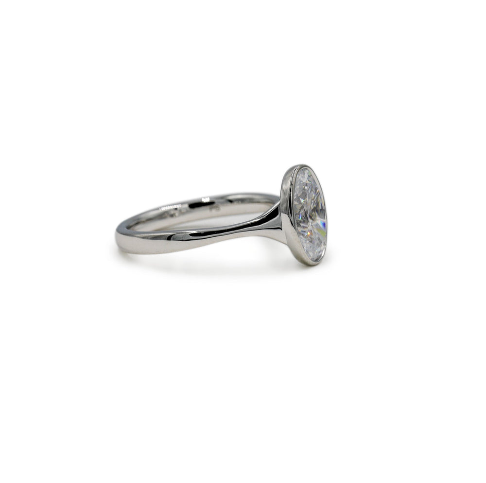 Platinum Oval-Cut Bezel Tapered Cathedral Diamond Ring
