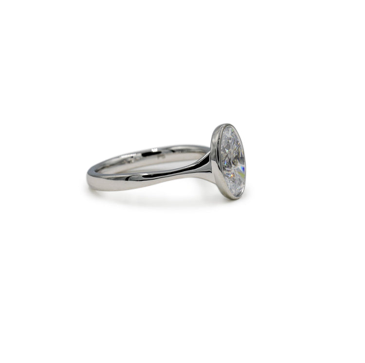 Platinum Oval-Cut Bezel Tapered Cathedral Diamond Ring