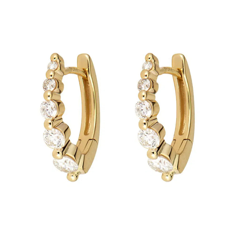 14ky Pair of Small Oval Graduated Diamond Huggie Hoop