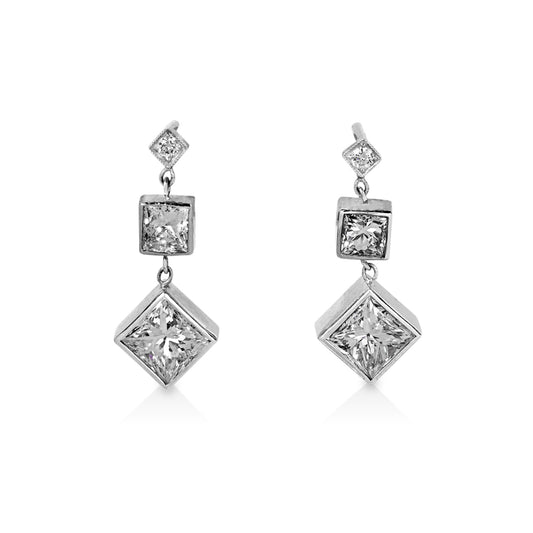 14kw 1.12ctw Princess Bezel Triple Diamond Dangle Earrings